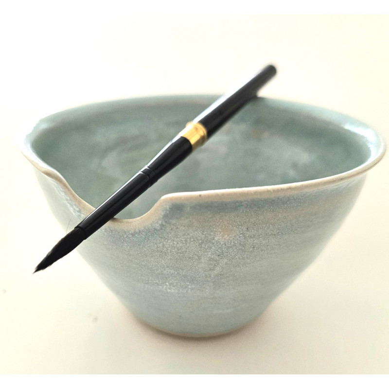Ceramic bowl with brush rest